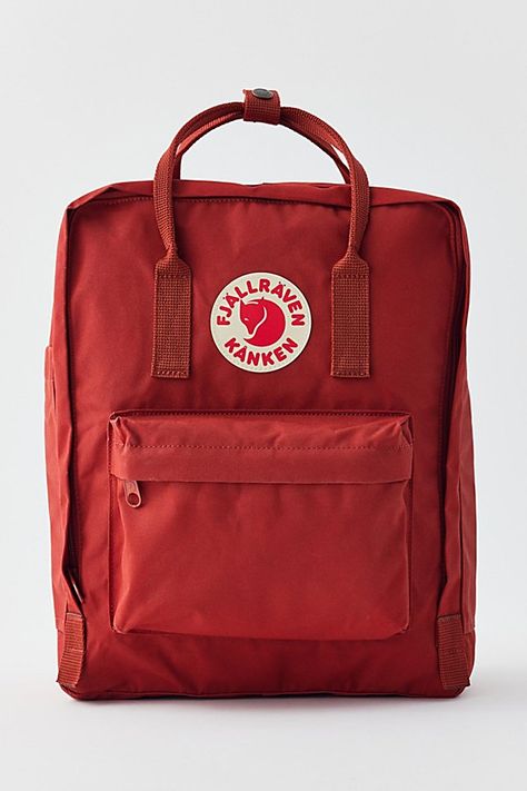 Lightweight coated canvas backpack from Fjallraven with a wraparound zip closure and an interior envelope pocket for toting your tablet. Topped with an additional zip pocket at the front and adjustable, webbed straps at the back. Double carry handles along the top. Features Fjallraven Kånken backpack Iconic Fjallraven backpack Lightweight backpack design Interior tablet pocket Adjustable straps Wraparound zipper closure Content + Care PVA, polypropylene, mixed metal Spot clean Imported Size Dime Red Backpack Aesthetic, Urban Outfitters Backpack, Fjallraven Backpack, Backpack Fjallraven, Envelope Pocket, Backpack Design, Aesthetic Backpack, Orange Backpacks, Pinterest Contest