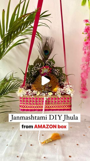 STUTI GUPTA : Home Decor & Lifestyle ✨🧿 on Instagram: "Janmashtami DIY Jhula from last year🌸
Before I share this year’s Janmashtami jhula, here’s a recap of what I did last year🥰

Materials required- cardboard box, thermocol, cloth pieces ,laces, ribbon, fresh flowers , mor pankh , peppal leaves (you can use betel or banana leaves as well)

- Cut the flaps of box and secure it with tape from bottom and staple the cutout for the back support. 
- Use wide ribbon for the balance , use can 4 holes also (2 on each side) if your kahna Ji’s size is above 0
- Use thermocol to fill inside the box , I sticked those using toothpick. You can use Fevicol but DO NOT use fevibond as it will melt it.
- Cover the thermocol with velvet fabric  as shown. Add fabric to the bottom and laces around the box. Krishna Jhula Diy, Janmashtami Jhula, Cloth Pieces, Amazon Box, Banana Leaves, Inside The Box, Festive Decor, Back Support, Banana Leaf