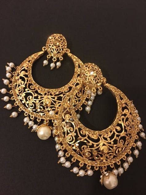 beautiful big size handcrafted gold plated Hyderabadi chandbali earrings. The earrings are embellished with stones and pearls to finish the look. Hyderabadi Jewellery, Big Earrings Gold, Hyderabadi Jewelry, Bridal Necklace Designs, Earring Styles, Sabyasachi Jewellery, Gold Earrings Models, Bridal Jewellery Design, Golden Goddess