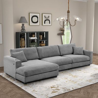 The extra-wide seat and chaise lounge provide luxurious and comfortable seating options, enhanced by convenient features like cup holders and USB charging ports. The thick corduroy fabric adds to the overall comfort and elegance of the sofa, making it a perfect choice for any living space. Body Fabric: Gray Corduroy | Gray Sectional - HongJunFurniture Modern Oversized L-Shaped Corduroy Sectional Sofa w / USB Port & Cup Holder Corduroy | Wayfair Couches Living Room Comfy, Pit Couch, Corduroy Sectional, Sofa Making, Comfy Sectional, Gray Sectional, Grey Sectional, Fabric Gray, Corduroy Fabric