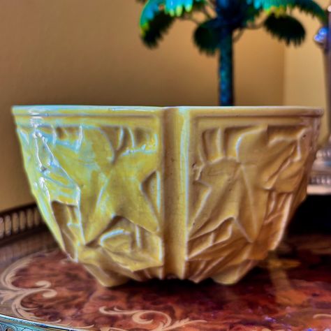 #mellowyellow & a stunning piece of #americana #vintagemccoy pottery. A rare #mccoypottery piece, she is footed…but what makes this #flowerpot special, she is also a #hangingflowerpot The obvious grooves in between the embossed #ivyleaves is where one could add a retro #crochetplanthanger or chains. In beautiful condition, with typical crazing. Measurements: 3 3/4”H x 6.5”W 🛍️DM Within Or Visit Our Boutique ⚜️LINK IN BIO⚜️ #mccoy #mccoypotterycollector #mccoycollection #vintagemccoy #v... Crochet Plant Hanger, Hanging Flower Pots, Mccoy Pottery, 4 H, Flower Pots, Boutique, Quick Saves