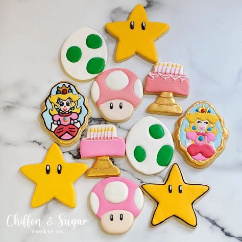 custom birthday party sugar cookies,  pink Mario theme, princess peach, royal icing Peaches Birthday Theme Mario, Princess Peach Birthday Cupcakes, Peaches Party Theme Mario, Princess Peach Birthday Party Diy, Princess Peach Treats, Princess Peach Sugar Cookies, Princess Peach Cookies Decorated, Princess Peach Dessert Table, Girly Mario Birthday