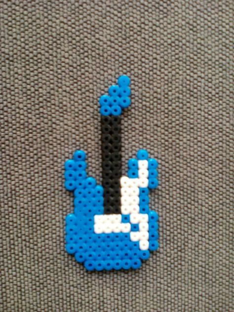 Electric guitar Guitarra eléctrica Hama beads #electricguitar #guitarra #hama Guitar Hama Beads, Electric Guitar Perler Beads, Electric Guitar Pixel Art, Perler Bead Guitar, Guitar Perler Beads, Iron Beads Ideas, Ironing Beads Ideas, Ironing Beads, Melt Beads Patterns