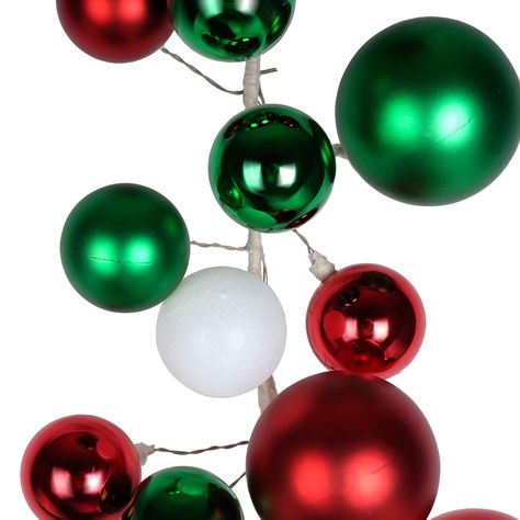 Purchase the 6ft. Red & Green Ball Garland by Ashland® at Michaels. Jazz up your festive home décor with this ball garland. You can use it to decorate your living room wall, doorway or mantel for some visual flair. Jazz up your festive home décor with this ball garland. You can use it to decorate your living room wall, doorway or mantel for some visual flair. Details: Red and green 6 ft. (1.8 m) Plastic, iron, paper and PVC glitter For indoor use | 6Ft Red & Green Ball Garland by Ashland® | Mich Silver Garland, Ornament Garland, Red Green Christmas, Green Garland, Ball Garland, Christmas Mantels, Arts And Crafts Supplies, Green Christmas, Ball Ornaments