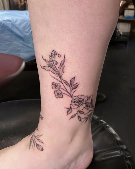 Birth Flower Ankle Wrap! • Had to use a single needle for majority of it 😅 but she took it like a G 😉 💥Consists of a Lily of the Valley (May), Violet (February), Rose (June), Holly (December), Larkspur (July), and Cosmos (October)! • • • Artist: @erinsanchez_tattoos Shop: @cultivatedink • • • • • • • • #birthflower #birthflowertattoos #wraparoundtattoo #girlytattoo #botanicaltattooartist #botanicaltattoo #fortworthtattoos #fortworthtattooartist #fortworthtattoo #fortworthtattooshop #fortwo... Wrap Around Tattoo, Birth Flower Tattoos, Botanical Tattoo, Girly Tattoos, Ankle Wrap, Birth Flower, Birth Flowers, Tattoo Shop, Lily Of The Valley