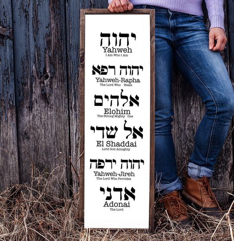 "Yahweh, Yahweh-Rapha, Elohim, El Shaddai, Yahweh-Jireh, and Adonai Wall Sign Decor is a visual reminder of the names of God. This piece would be a meaningful gift or a great wall decor for your house or prayer room. It is made of wood with a design made of vinyl. The frame is stained in a dark walnut color. You can choose between white and black. Measurements: H 36\" x W12\" Every sign we create is custom-made. Some parts may have knots, blemishes, or different grain patterns as each piece of w Yahweh Rapha Tattoo, Adonai Tattoo, Yahweh In Hebrew, El Shaddai Hebrew, Yahweh Hebrew, Hebrew Home Decor, Yahweh Rapha, Apartment Construction, Yahweh Sabaoth