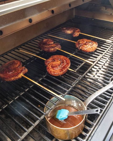 Meat candy on a stick! These smoked pork belly pinwheels with maple bourbon glaze are sweet, sticky, and down right delicious. Pork Belly Pinwheel, Candy On A Stick, Bacon Jam Burger, Maple Bourbon Glaze, Smoked Pork Belly, Smoker Ideas, Meat Candy, Broccoli Cheddar Soup Recipe, Pin Wheels