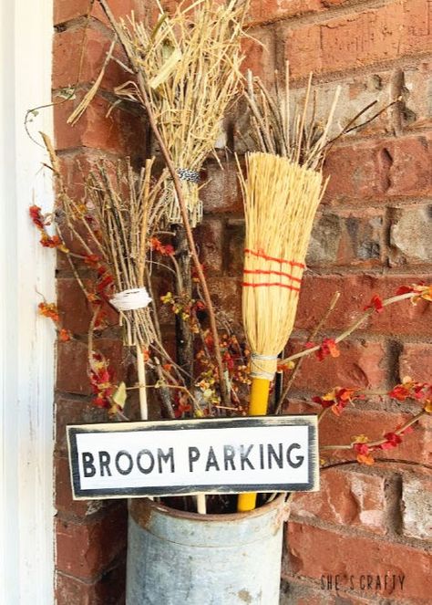 Halloween Home Tour - broom parking with diy twig brooms  |  She's Crafty Witches Broom Porch Decor, Halloween Broom Parking, Hanging Brooms Halloween, Broom Parking Sign Diy, Broom Decorations Ideas, Halloween And Fall Decorations Together, Halloween Decorating Ideas For The Home, Diy Halloween Signs, Aesthetic Halloween Nails