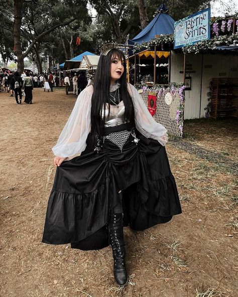 Petals & Poison went on an adventure to the @renaissancepleasurefaire ⚔️🖤 Necklace: @petalsandpoison Belt: @skelly.b0nes Crown: @voodooodolly Blouse: @ixdoxdeclare Skirt: Scarlet Darkness Corset: Thrifted Harness: Deandri Scarlet Darkness, Scarlet, Crown, Skirt, Quick Saves