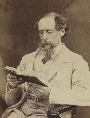 This photo of Charles Dickens was taken in December 1844, during a visit to the United States. He gave public readings of A Christmas Carol in theaters to promote the book, and copies were in high demand. Celebrities Reading, Little Dorrit, Robinson Crusoe, Historical People, Writers And Poets, Book Writer, Famous Authors, Reading A Book, Charles Dickens