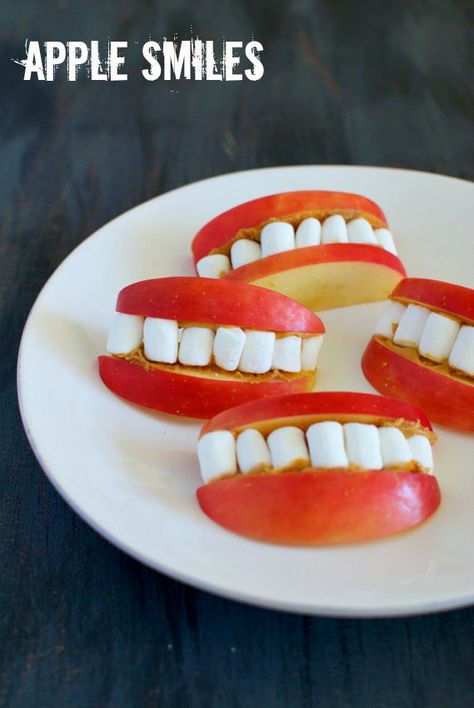 Apple Smiles Recipe - perfect for a Halloween party, or just an afternoon snack in the fall! - via Eating Made Easy Halloween Decorations Party Food, Apple Smiles, Easy Halloween Party Food Ideas, Halloween Party Food Ideas, Easy Halloween Party Food, Easy Halloween Snacks, Kids Halloween Food, Halloween Party Food, Food Halloween