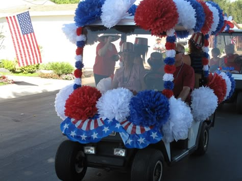 4th of July golf cart parade decoration @Joann Humburg you get the idea - love this one, but wonder if they'd blow off?? 4th Of July Golf Cart, Golf Cart Parade, Golf Cart Decorations, Bike Parade, Blue Party Decorations, Paper Pom Pom, 4th Of July Parade, Fourth Of July Decorations, Tissue Paper Pom Poms