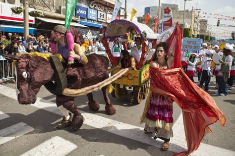 Israelis parade with a float to celebrate the Jewish holiday of Purim on February 24, 2013 in the central Israeli city of Netanya. The carnival-like Purim holiday is celebrated with parades and costume parties to commemorate the deliverance of the Jewish people from a plot to exterminate them in the ancient Persian empire 2,500 years ago, as recorded in the Biblical Book of Esther.   AFP PHOTO / JACK GUEZ        (Photo credit should read JACK GUEZ/AFP/Getty Images) Bible Maps, Esther Bible, Book Of Esther, About Letting Go, Jewish Calendar, Jewish Festivals, Bible Mapping, Persian Empire, Ancient Persian