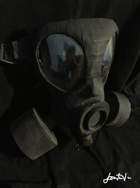 Paper mâché gas mask using cardboard, paper, t-shirt strips, plastic bottles, parts of a back-pack, and acrylic paint. Nerds Aesthetic, Cardboard Masks, Nuclear Engineering, Cardboard Mask, Nerd Aesthetic, Tv Head, Masks Crafts, Head Mask, Skull Mask