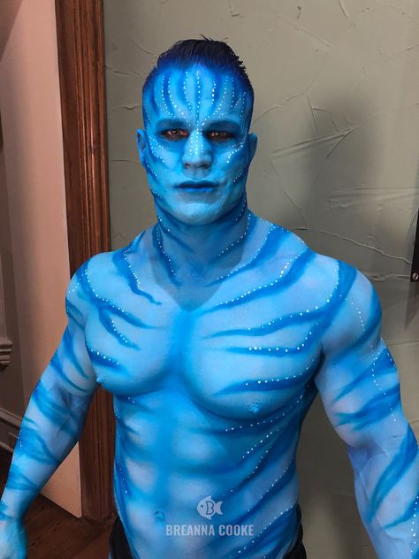 Man painted with blue body paint and blue zebra stripes like Avatar character. Blue Avatar Costume, Body Painting Men, Guy Face, Avatar Makeup, Avatar Halloween, Stilt Costume, Underwater Photoshoot, Mens Halloween, Blue Avatar