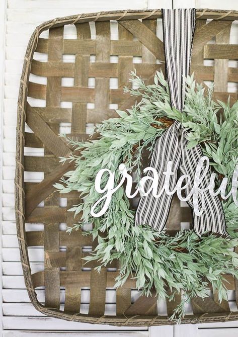 Gorgeous farmhouse style fall wreath. I love the mix of neutral greenery and galvanized metal on the tobacco basket. Click for complete source list. #falldecor #fallwreath #wreaths #wreathtutorial #farmhousedecor #tobaccobasket #greenery #tickingstripe #ribbon Film Decor, Gorgeous Farmhouse, Floral Pumpkin, Farmhouse Side Table, Farmhouse Remodel, Cute Dorm Rooms, Fall Mantel Decorations, Fall Mantel, Front Porch Christmas Decor