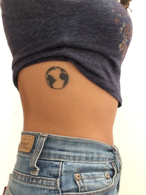 Tattoo on side of a planet earth Black And White Earth Tattoo, Tiny Globe Tattoo, Earth Back Tattoo, Earth Day Tattoo Ideas, Half Earth Tattoo, Earth Day Tattoo, Tatoos Travel, Earth Tattoo Ideas Nature, Come Back To Earth Tattoo