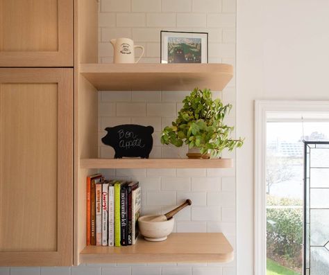 Embracing the charm of open shelving in this inviting kitchen corner. Corner Open Shelves Kitchen, Corner Open Shelves, Corner Kitchen Shelves, Open Shelves Kitchen, Shelving In Kitchen, Window Corner, Inviting Kitchen, Coastal Condo, Corner Kitchen