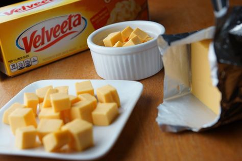 Melting Velveeta transforms it from a block of semi-soft cheese to a gooey topping or main dish component with a distinct American cheese flavor. It melts easily on the stovetop, in the microwave or in a slow cooker. Use it to make Velveeta cheese sauce, nachos or macaroni and cheese. Velveeta Cheese Sauce, Melted Cheese Sauce, Easy Cheese Dip, Quick Mac And Cheese, Velveeta Mac And Cheese, How To Make Cheese Sauce, Stovetop Mac And Cheese, Easy Mac And Cheese, Easy Cheese Recipes