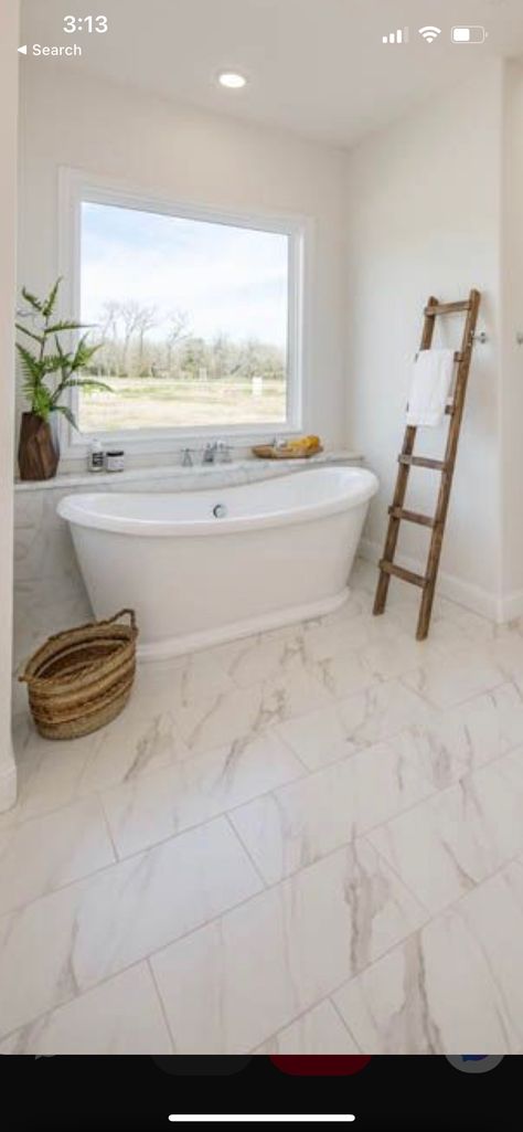 Free Standing Bathtub Under Window, Bathroom Shelves Behind Tub, Window Behind Tub Master Bath, Master Tub Light Fixture, Master Bath With Free Standing Tub Layout, Free Standing Bath Bathroom Ideas, Bathroom Shelving Above Tub, Tub With Window Over It, Free Standing Tub In Front Of Window