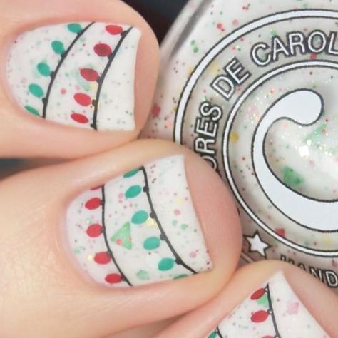 Jess on Instagram: "🎄🎄🎄
My base is @coloresdecarol’s Let’s Celebrate. 
Stamping done with Powder Perfect’s Christmas 01 plate. 
Stamping polishes are all by @hellomaniology and include:
❤️ Fireside 💚 Malachite
🖤 Straight Up Black
Use code DAY10 for 20% off anything in the @hellomaniology Holiday Shop. If what you’re looking for isn’t available in the holiday shop, you can use my affiliate discount code JESS10 for 10% off. Click the link in my bio to shop. 
Stamper and scraper also from @hellomaniology. 
Topped off with @cuticulanailcare’s strawberry kiwi scented Cloud Cover Matte Top Coat. I also used @cuticulanailcare’s Catch Me When it’s Fall scented peel off nail tape for easy cleanup. 🎄🎄🎄
#coloresdecarol #maniology" Kiwi Christmas, Matte Top Coat, Nail Tape, Strawberry Kiwi, Fall Scents, Me When, 20 % Off, Christmas Nails, Top Coat