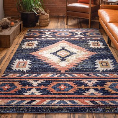 The collection draws upon a curated array of traditional Persian, southwestern, and Moroccan designs. A warm palette of red, blue, and green jewel tones is accented by neutral colors of ivory and beige for a rug that's easy to match with any decor. Rug Size: Rectangle 5'3" x 7'3" | Blue / White 63 x 0.4 in Area Rug - Well Woven Tulsa Lea Moroccan Area Rug | 63 W x 0.4 D in | Wayfair Western Bedroom, Floor Stain, Warm Palette, Southwestern Patterns, Southwestern Area Rugs, Blue Orange White, 6x9 Area Rugs, Western Homes, Well Woven