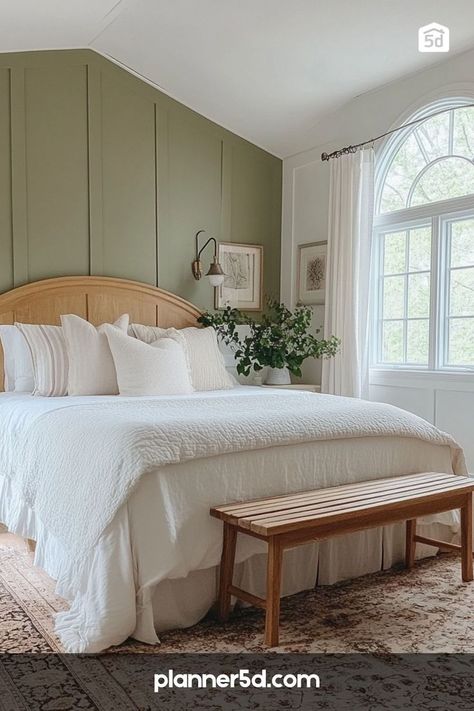 A bright bedroom with a green panel accent wall, white bedding, and wood furniture creating a fresh, airy look. Green And White Bedroom Ideas, Natural Wood Bed Frame, Accent Wall White, Soft Green Bedroom, Panel Accent Wall, Light And Airy Bedroom, Bedroom Planner, Green And White Bedroom, Natural Wood Bed