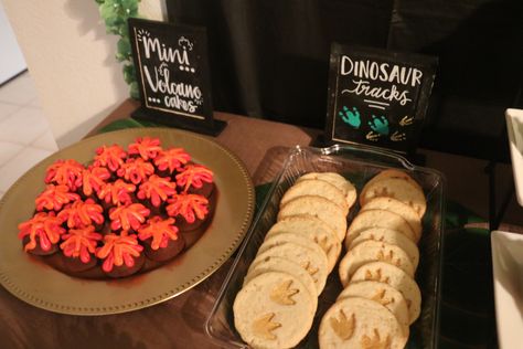 Dino Track Cookies and volcano brownie bites Dino Brownies, Dino Tracks, Dinosaur Themed Party, Dinosaur Theme Party, Brownie Bites, Themed Party, Volcano, Brownies, Party Themes