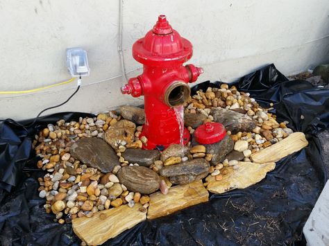 This is the Fire Hydrant Water feature I built(with help) ! Fountain Decor, Pond Decor, Pondless Waterfall, Firefighter Home Decor, Fire Hydrants, Firefighter Decor, Fire Life, Water Falls, Ponds Backyard