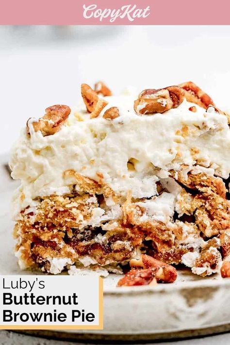 Dive into the unique charm of Luby's Butternut Brownie Pie! While it may not have conventional brownie elements, this pie stands out with its ethereal meringue filled with crunchy graham cracker pieces and pecans. Baked to perfection and crowned with a lavish layer of whipped cream, every slice promises a delightful crunch and melt-in-the-mouth experience. A sprinkle of pecans on top seals the deal. Get the easy Luby’s copycat recipe and rediscover the art of dessert with this unexpected treat. Unique Pies, Brownie Pie, Copykat Recipes, Scrumptious Desserts, Copycat Recipe, Graham Cracker, Restaurant Recipes, Pecans, Copycat Recipes