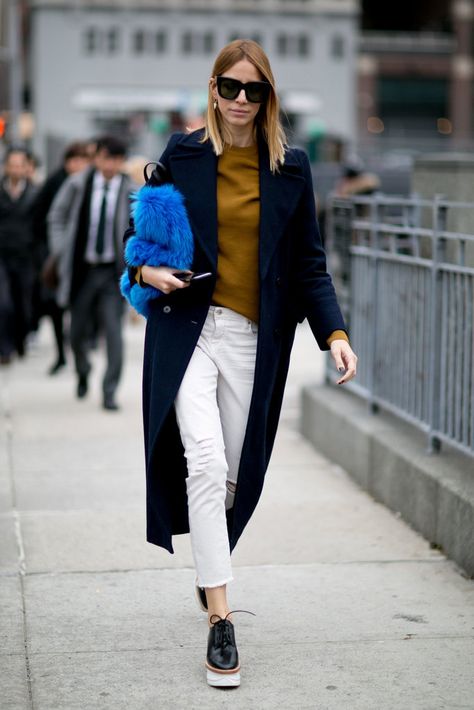 Cropped white jeans paired with long coat and platform flats. Rose Williams, Jessica Rose, Street Style 2016, Walking Down The Street, New York Fashion Week Street Style, Nyfw Street Style, Blue Coat, Kaia Gerber, Autumn Street Style