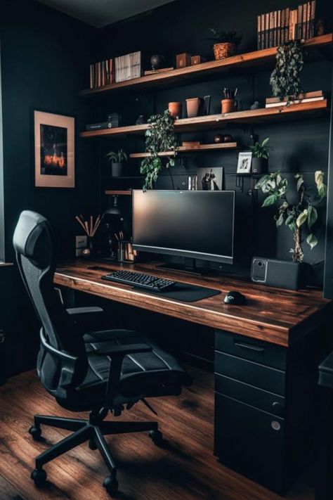 A Dark Moody Small Home Office featuring a sleek, minimalist desk setup with wooden shelves, plants, and warm lighting embodies the essence of Dark Scandinavian Minimalism, perfect for those seeking Moody Office Ideas for a Dark Modern Office or a Home Office Dark design. Desk With Accent Wall, Dark Minimalism Interior, Moody Academia Office, Dark Office Interior Design, Black And Wood Desk, Office Design Ideas Workspaces, Home Office Dark Wood, Dark Desk Setup, Industrial Office Design Workspaces