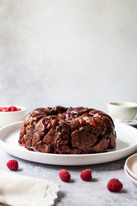 Enjoy irresistible raspberries and gooey chocolate in a warm pull-apart bread. Our recipe for Chocolate Raspberry Monkey Bread is the perfect treat! Holiday Desert Recipes, Beach House Kitchen, Monkey Bread Recipe, Flaky Biscuits, Summer Baking, The Beach House, Pull Apart Bread, Monkey Bread, Quick Desserts