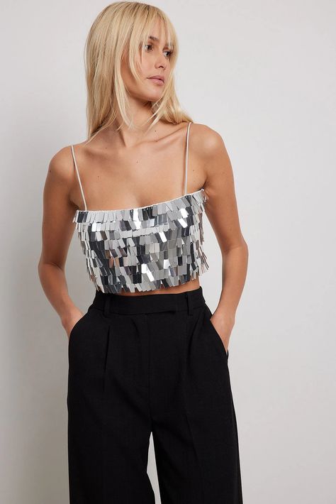 This top is lined and non-stretchy and features a square sequin materialIt has shoulder straps and cropped length. Sequin Crop Top Outfit, Silver Sequin Top Outfit, Sequins Top Outfit, Hslot Outfit, Swift Outfits, Nashville Outfit, Silver Sequin Top, Sequin Material, Uk Holiday