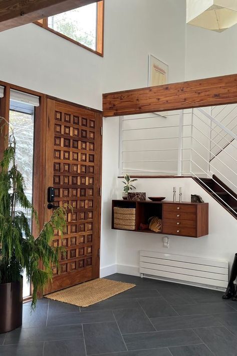 From wooden paneling to retro decor, these mid-century modern entryways are full of personality.

Image credit: Home Union Interior Design Entryway, Mid Century Entryway Ideas, Modern Entryway Ideas, Mid Century Modern Entryway, Wooden Paneling, Creating An Entryway, Mid Century Modern Interior Design, Modern Entry, Timeless Interior