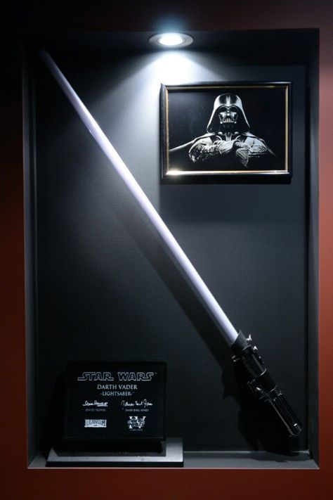 Wicked awesome lightsaber display. Lightsaber Collection Display, Lightsaber Decor, Lightsaber Display Ideas, Star Wars Gaming Room, Lightsaber Display, Casa Rock, Star Wars Man Cave, Geek Room, Star Wars Bedroom