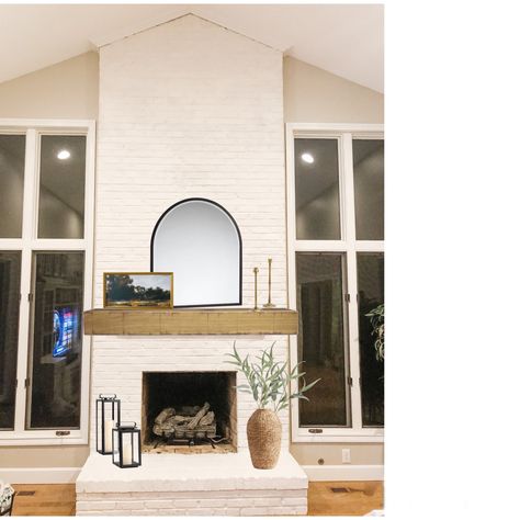 Fireplace Arch Mirror, Black Arch Mirror Over Fireplace, Arch Mirror Mantle Decor, Arch Mirror Fireplace Mantles, Arched Mirror Fireplace, Arched Mirror On Mantle, Black Mirror Above Fireplace, Horizontal Mirror Over Fireplace, Arched Mirror Mantle