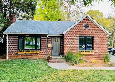 Black Windows Modernize Red Brick Home | Pella North Carolina Pella Impervia Windows, Black Windows Exterior, Farmhouse Exterior Paint Colors, Painted Window Frames, Framed Windows, Fiberglass Windows, Dark Windows, Brick Ranch, French Doors Patio