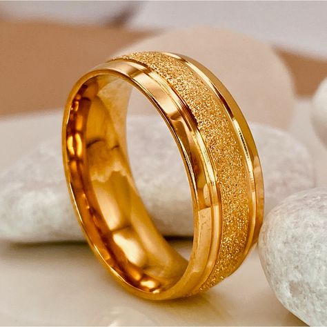 This Wedding Band Is Perfect For Those Who Want A Bold Piece That Reflects Their Personality And Is Equally Stylish And Durable. The Minimalist Design With Ice Matte Brushed Finish Create A Sleek And Refined Look That Pairs Easily With Any Outfit. Comfort Fit Ensures A Secure, Comfortable Wear That Won't Hold You Back. As It’s Crafted From Durable Materials, This Band Is Built To Be With You For A Lifetime, Witnessing Your Joys And Milestones. Features: - Titanium Steel 18k Gold Pvd Coated -Comf Gold Diamond Wedding Band Men, Mens Wedding Rings Unique Gold Bands, Male Promise Rings Gold, Classic Mens Wedding Bands, Male Rings Gold, Gay Wedding Rings For Men, Groom Engagement Ring, Men's Rings Gold Indian, Gay Wedding Rings