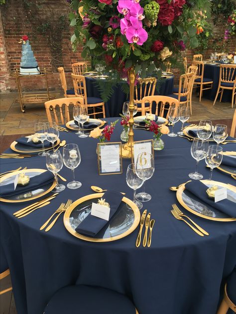 Navy Blue Party Decorations For Men, Navy Blue And Gold Table Setting, Royal Blue And Gold Table Setting, Navy And Gold Table Decor, Classy Wedding Reception Ideas, Blue And Gold Dinner Party, Navy Blue And Gold Quinceanera Theme, Navy Blue Table Decor, Royal Blue Table Setting