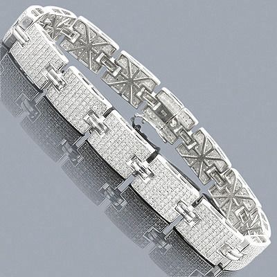 Sterling Silver Bracelets: This Mens Diamond Bracelet in sterling silver weighs approximately 41 grams and showcases 3.97 ctw of pave-set round diamonds. Featuring a versatile design, this is a great budget piece featuring polished sterling silver and genuine diamonds. This men's diamond bracelet is also available in 10K and 14K gold, please contact us for details. Mens Link Bracelet, Gents Bracelet, Mens Diamond Jewelry, Mens Bling, Mens Diamond Bracelet, Expensive Jewelry Luxury, Bracelets Design, Mens Bracelet Silver, Expensive Jewelry