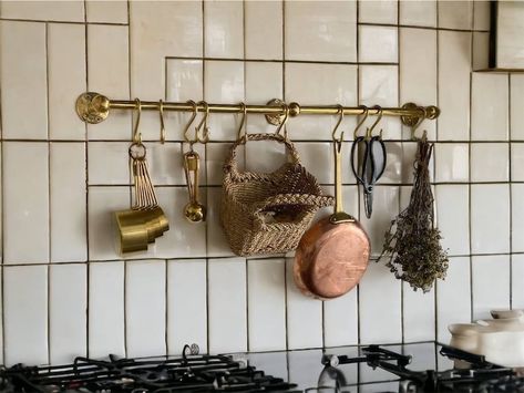 Looking to give your kitchen a vintage makeover? Enhance its aesthetic appeal with a brass pot and pan organizer from Kitchen Pot and Pan Hanger. Our unlacquered brass hanger and hooks offer the perfect look, handcrafted with exceptional attention to detail. Featuring a sturdy bar, heavy brackets, and well-shaped hooks, this masterpiece will elevate your kitchen's decor and become the star attraction. #brasspotrail #potrail #kitchen #hangingrail Pot And Pan Hanger, Brass Pot Rail, Pot Rail, Pan Hanger, Vintage Makeover, Pot And Pans Organization, Pot Organization, Hanging Pans, Brass Pot