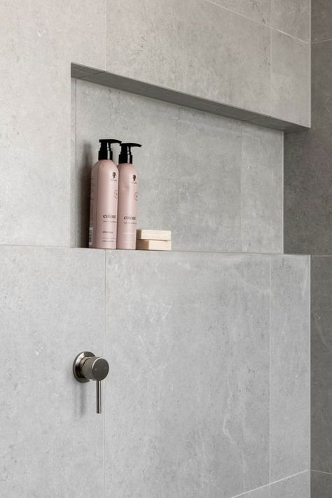 To create the desired sense of openness, our interior designer, Lucy, carefully selected finishes, opting for a light, monochromatic colour scheme. Hints of grey can be seen in the floor tiles, wall tiles, and engineered stone.  📷: Joel Noon Light Grey Bathroom, Shower Ledge, Ensuite Layout, Light Grey Bathrooms, Monochromatic Colour, Grey Wall Tiles, Grey Bathroom Tiles, Grey Floor Tiles, Grey Bathroom