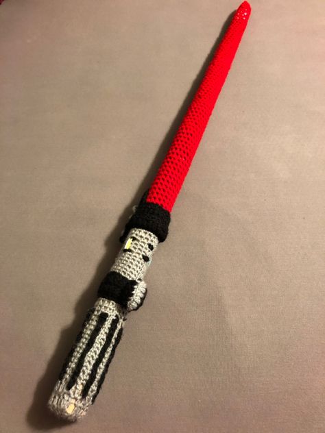 Realistic crochet Darth Vader lightsaber. Freehand, no pattern. Star Wars Tapestry Crochet, Easy Star Wars Crochet Pattern, Darth Vader Crochet Pattern, Lightsaber Crochet, Darth Vader Crochet Pattern Free, Crochet Lightsaber Pattern Free, Knitted Lightsaber, Crochet Lightsaber, Storm Trooper Crochet