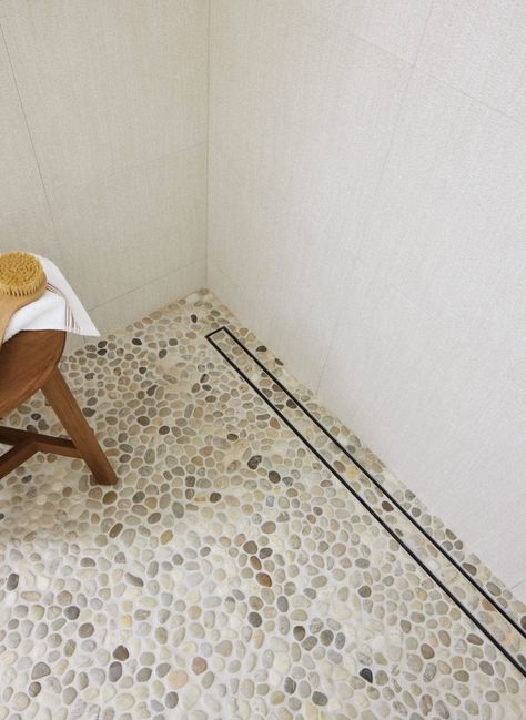 Annie Selke's Palm Springs Desert Oasis - The Tile Shop Blog Pebble Mosaic Shower Floor, Pebble Shower, Pebble Shower Floor, Small Wooden Stool, Pebble Mosaic Tile, Small Mosaic, Pebble Tile, Shower Floor Tile, Feature Tiles