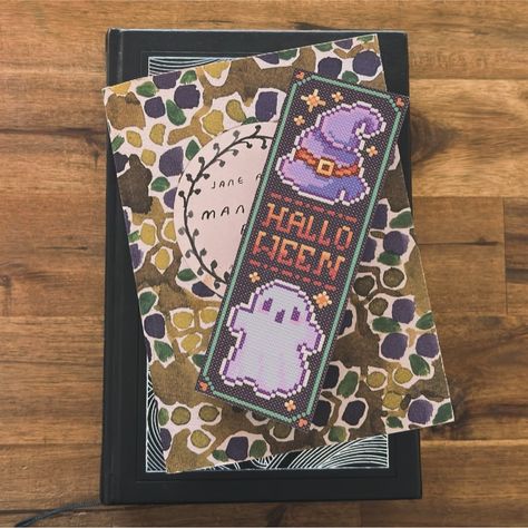 Here’s the pattern for my Halloween Cross Bookmark 😝 #crossstitching #crossstitchersofinstagram #crossstitch #halloween #spooky #spookyseason #embroidery #bookmarks #crossstitchaddict #crossstitchpattern #bookmarksofinstagram #dmc #dmcembroidery #etsyshop #etsy #craft #embroideryart #embroideryartist #halloweendecor #readers #pixelart #pixelartist #retro #retroart #8bit #16bit #foryou #foryoupage #explorepage #explore Embroidery Bookmarks, Cross Bookmark, Halloween Spooky, 8 Bit, Retro Art, Embroidery Art, Pixel Art, Cross Stitch Patterns, Stitch Patterns