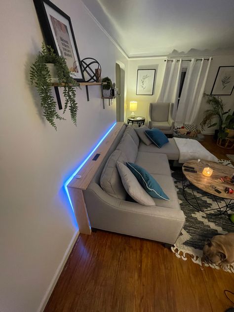 Oak board Couch console with speed charger outlet and LED smart light. Behind The Couch Lighting, Light Behind Couch, Behind Sofa Shelf, Behind Couch Shelf, Shelf Behind Sofa, Table Decor Behind Couch, Behind The Couch Shelf, Sofa Table Decor Behind Couch, Behind The Couch Console Table