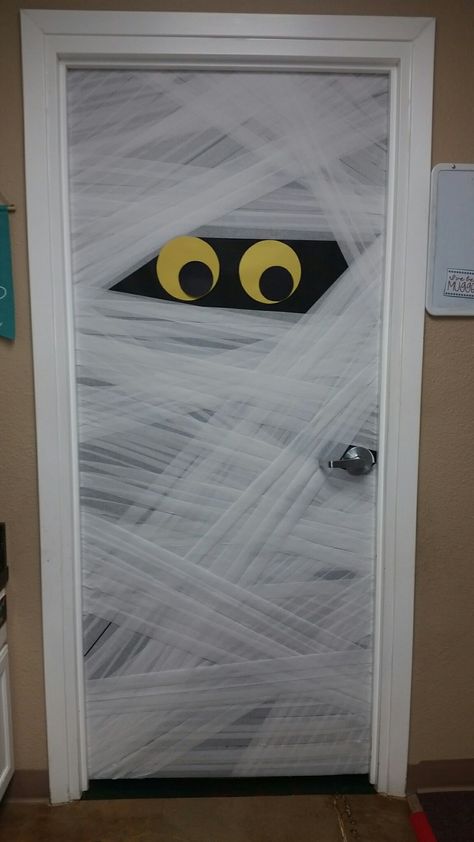 Look who is peeking through the Hummingbird door this Halloween. Halloween Door Contest, Halloween Door Decorating, Puerta Halloween, Halloween Door Ideas, Halloween Door Decorations Classroom, Porta Halloween, Diy Halloween Door Decorations, Halloween Doors, Halloween Classroom Door