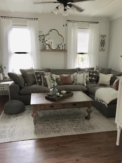 Gray And White Farmhouse Living Room, Cream Couch Grey Floors, Charcoal Grey Sectional Decor, Modern Farmhouse Grey Living Room, Modern Farmhouse Grey Couch Living Room, Grey Couch Wood Furniture, Grey Sofa Dark Wood Furniture, Dark Floor Grey Couch, Farmhouse Living Room With Dark Grey Couch