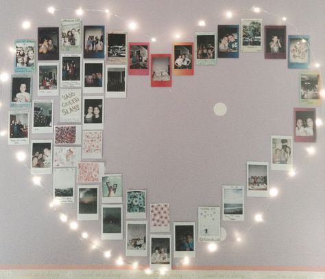 All you have to do is tape Polaroids to ur wall and line them with cute fairy lights. Such a cute diy! Polaroid Wall With Fairy Lights, Fairy Lights With Polaroids, String Lights With Pictures, Polaroid Wall Lights, Polaroid Aesthetic Wall, Photo Wall Fairy Lights, Fairy Lights With Pictures, Fairy Light Photo Wall, Polaroid Decoration Ideas